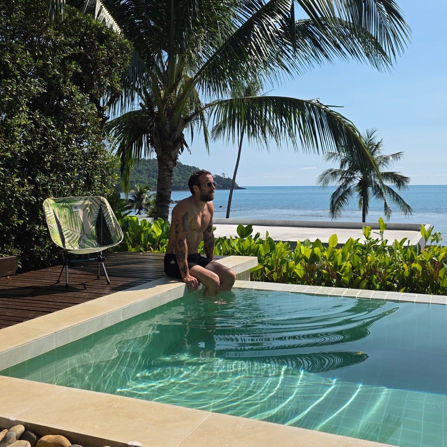 packable outdoor chair with palm pattern by Suniela Beach