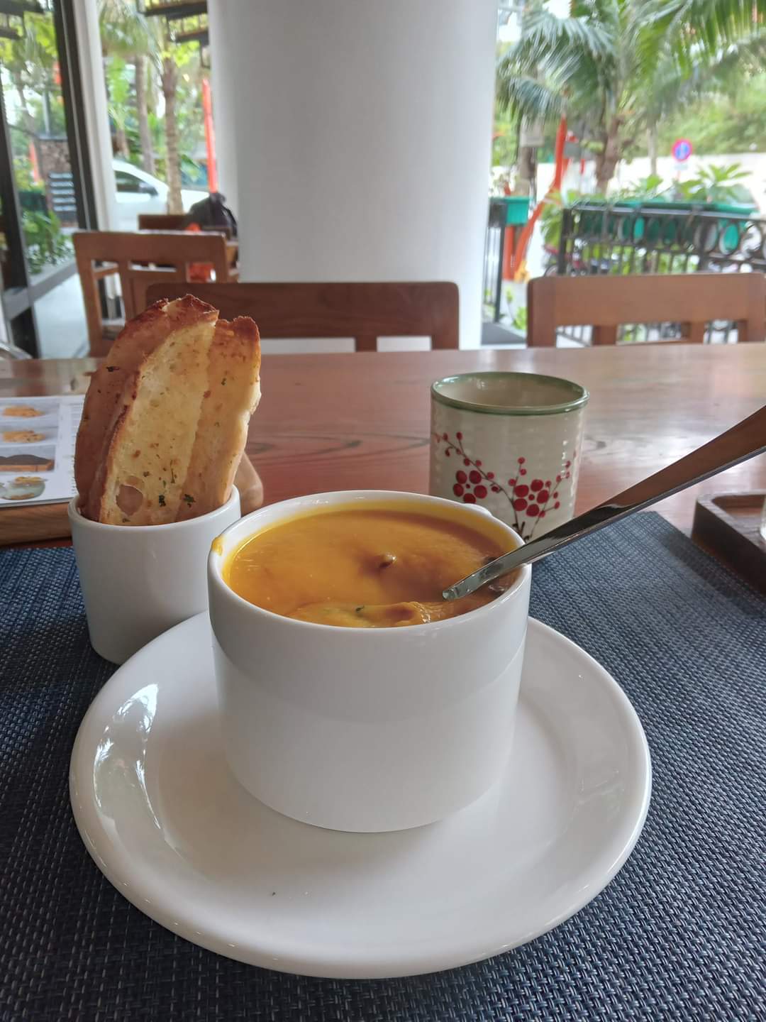 A hot coffee on a patio of a restaurant in Da Nang, Vietnam